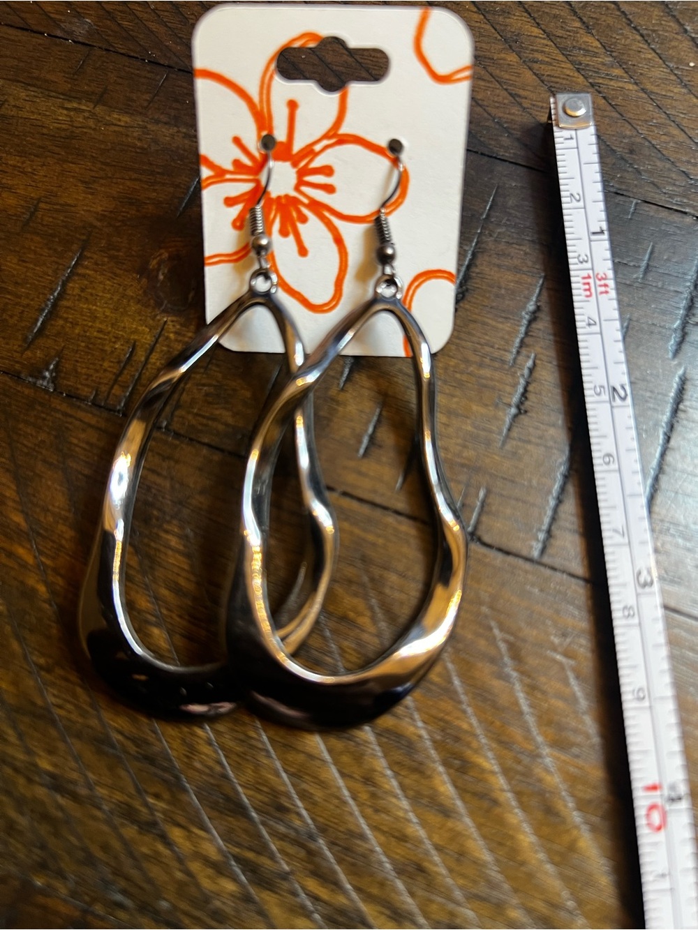 Sleek Twisted Teardrop Hoop Earrings - Gun Metal Tone